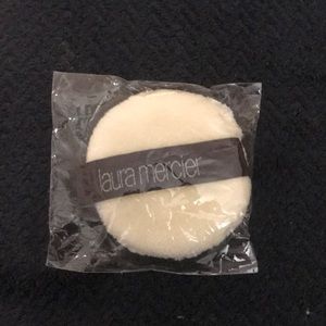 And Laura Mercier powder puff